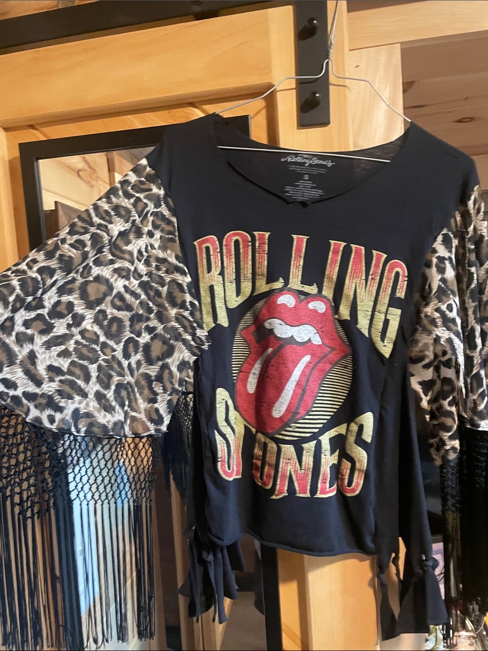 the Rolling Stones Black Tee with Red Tongue and Leopard Flutter Sleeves